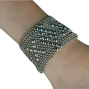 SG Liquid Metal Chrome Finish Hugs And Kisses Bracelet by Sergio Gutierrez